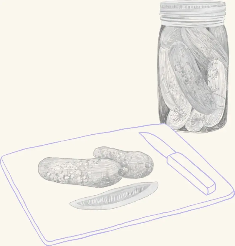 A jar of pickles beside sliced cucumbers on a cutting board
