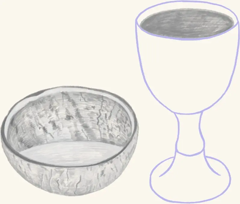 A goblet beside a bowl of a fermented drink