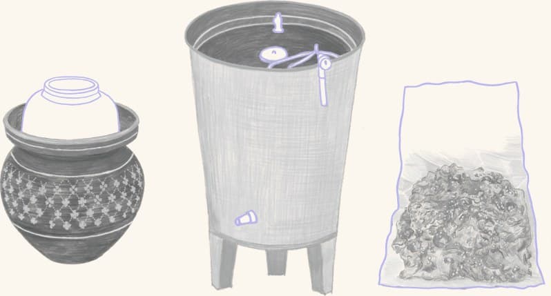 A ceramic crock and a spigoted fermentation vessel