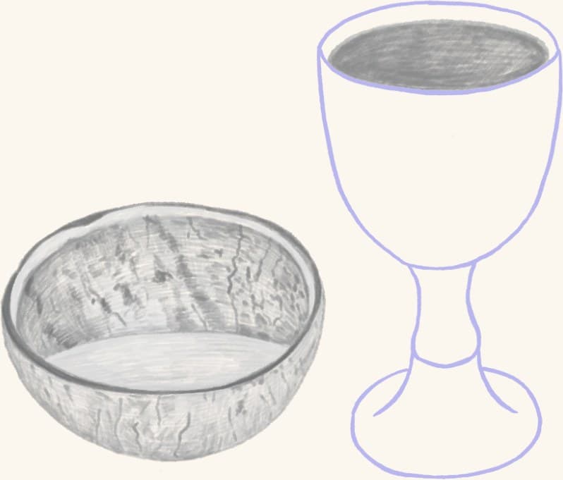 A goblet beside a bowl of a fermented drink