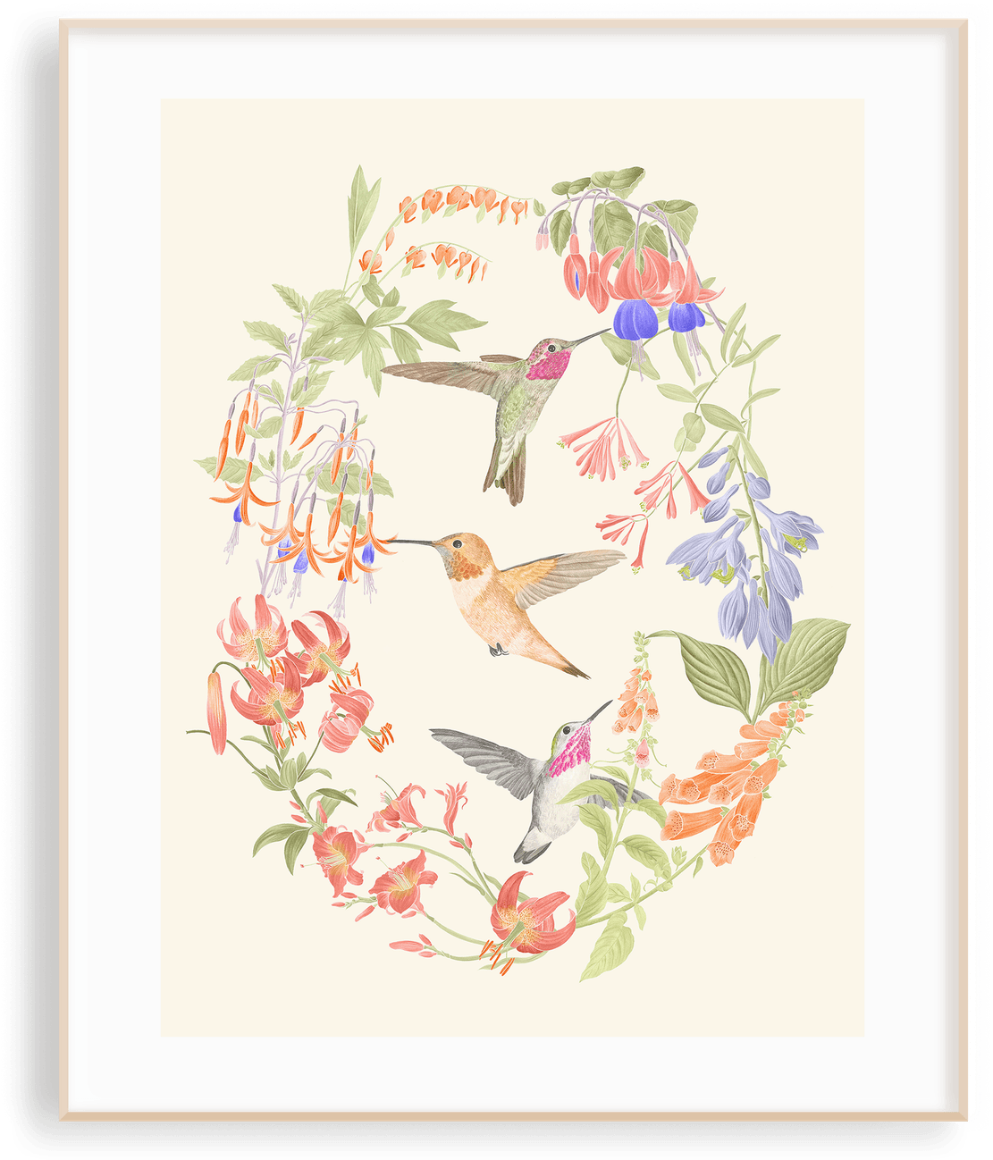 The Wings of Freedom hummingbirds print in a light wood frame — watercolour hummingbirds among fuchsias, tiger lilies, hostas, and bleeding hearts